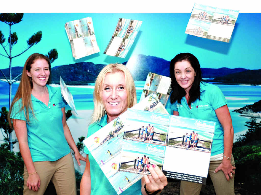 WMDL staff pose in front of a photograph of Whitehaven Beach and Hill Inlet taken by Whitsunday photographer Shane Batham from 'Into the Blue Gallery' and www.shanebatham.com WMDL staff pose in front of a photograph of Whitehaven Beach and Hill Inlet taken by Whitsunday photographer Shane Batham from 'Into the Blue Gallery' and www.shanebatham.com